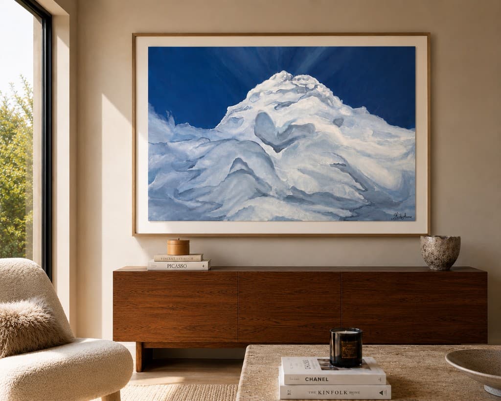 Summit Sky cloud painting in a wide mat frame above a credenza