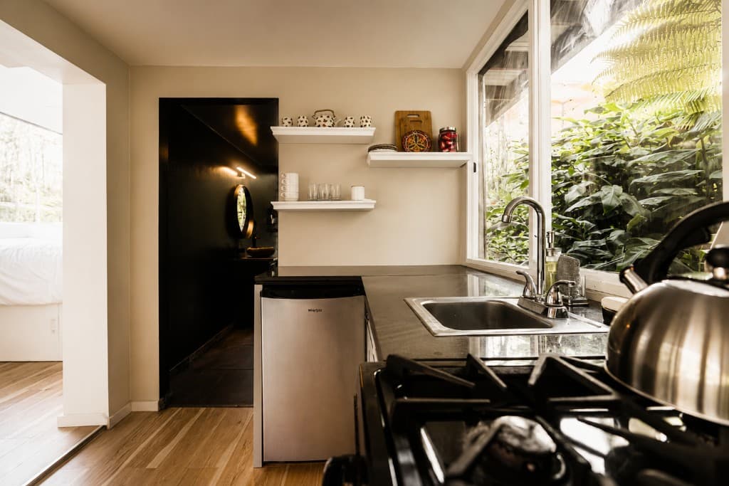Kitchen looking out to the rainforest